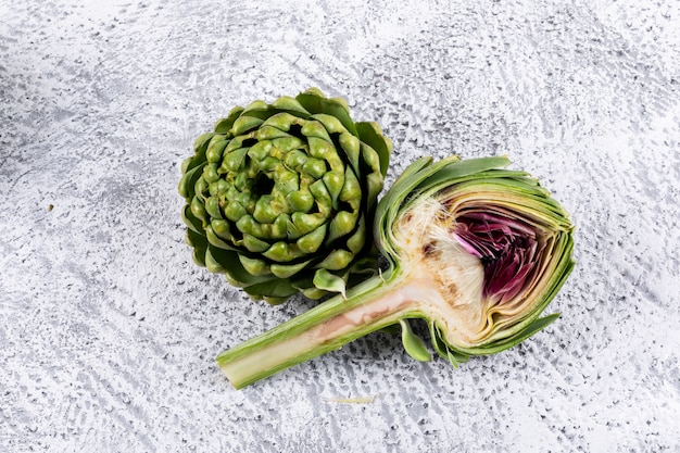 Top view fresh artichoke with slice. horizontal