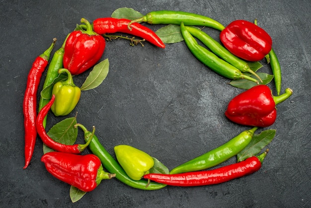 Top view fresh bell-peppers with spicy peppers