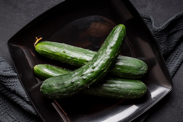 Free photo top view of fresh cucumbers