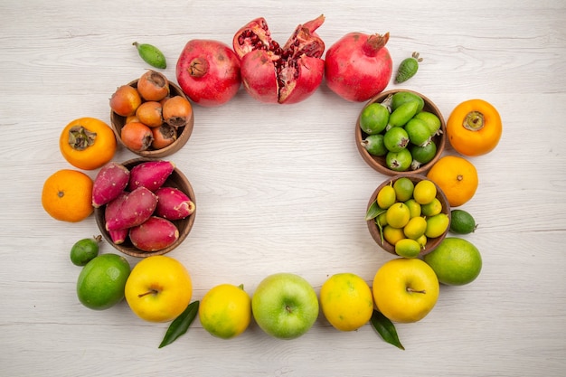 Top view fresh fruits composition different fruits on white background