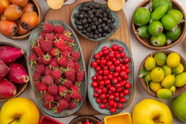 Free photo top view fresh fruits composition on white background