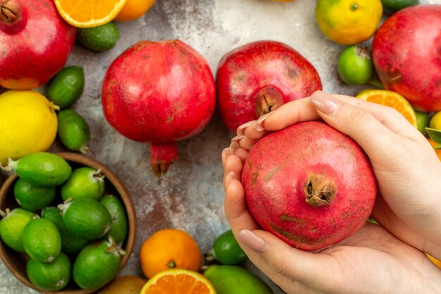 Top view fresh fruits different mellow fruits on white background berry citrus health tree color ripe tasty