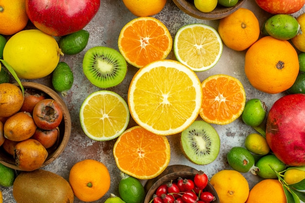 Top view fresh fruits different mellow fruits on white background tree tasty photo ripe diet color health berry citrus