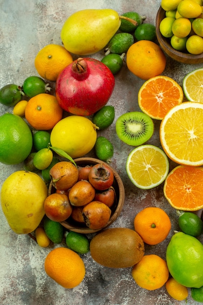 Top view fresh fruits different mellow fruits on the white background tree tasty  ripe diet color health berry citrus