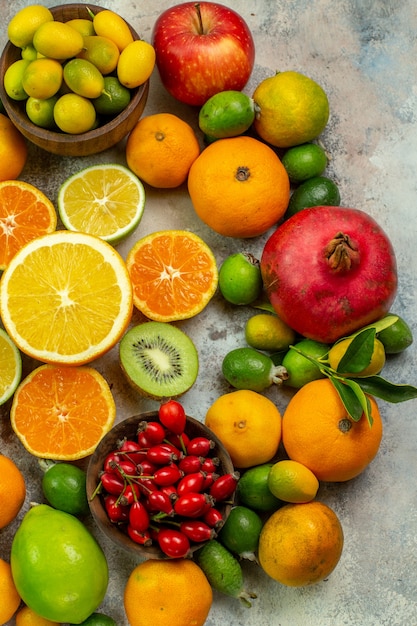 Free photo top view fresh fruits different mellow fruits on white desk tree tasty  ripe diet color health berry citrus