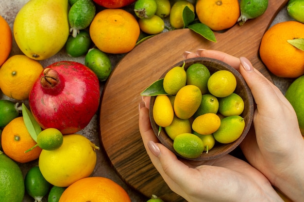 Top view fresh fruits different ripe and mellow fruits on white background