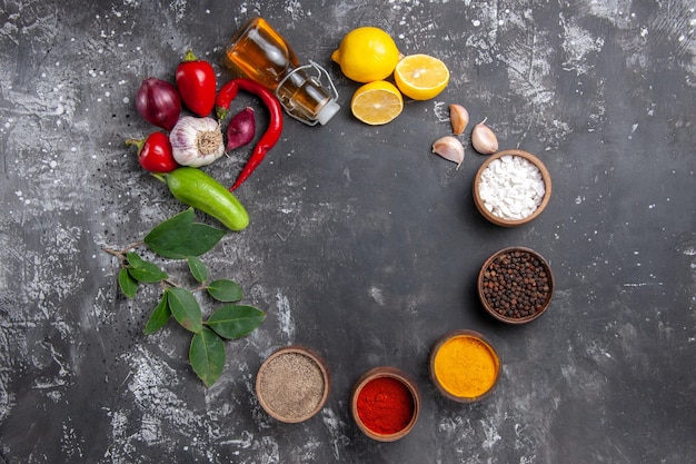 Top view fresh ingredients with lemon and seasonings