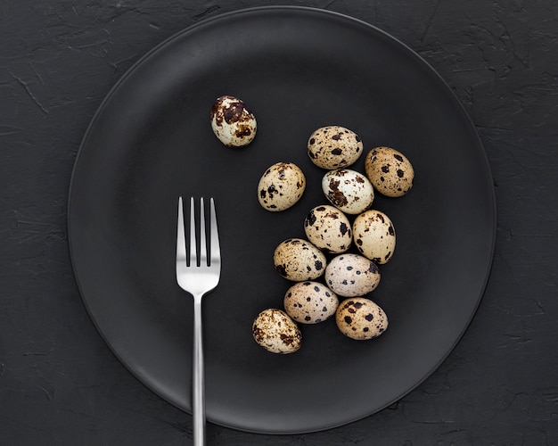 Free Photo top view fresh quail eggs on the table