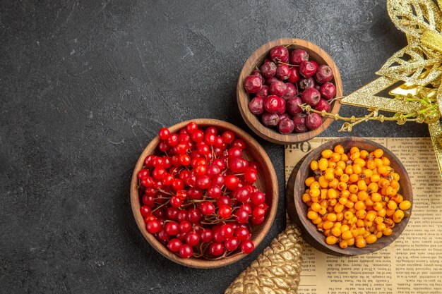 Top view fresh red cranberries on dark background