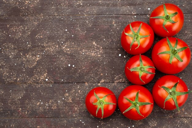 Top view fresh red tomatoes ripe on wood