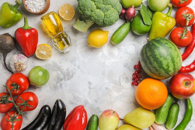 Top view fresh ripe vegetables with fruits on white desk