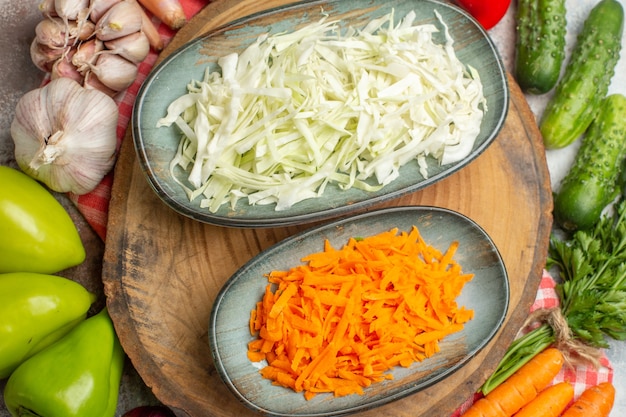 Top view fresh vegetables composition on white background