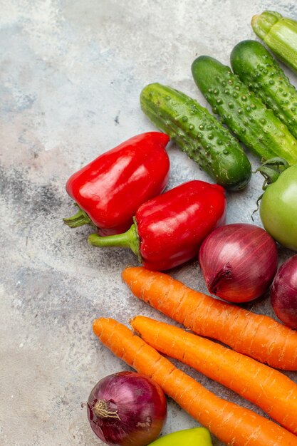 Top view fresh vegetables composition on white background