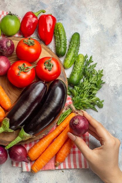 Free photo top view fresh vegetables composition on white desk diet color ripe healthy life meal salad