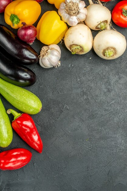 Top view fresh vegetables on a dark background