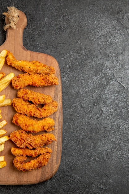 Free photo top view of fried chicken and french fries