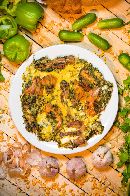 Free photo top view of fried chicken with eggs and herbs