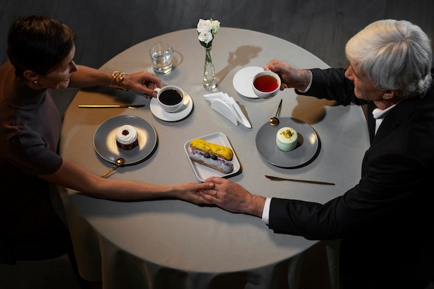 Top view friends having lunch  in luxury restaurant