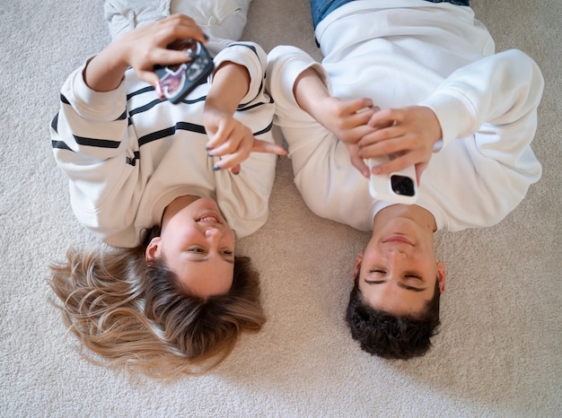 Top view friends spending time indoors