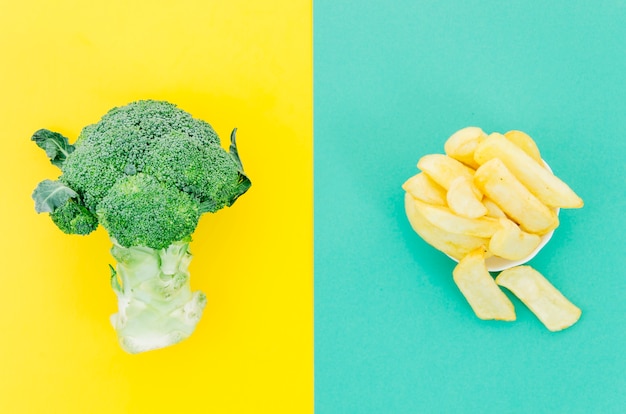 Top view fries vs vegetables