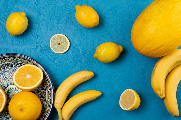 Free photo top view of fruits on blue background