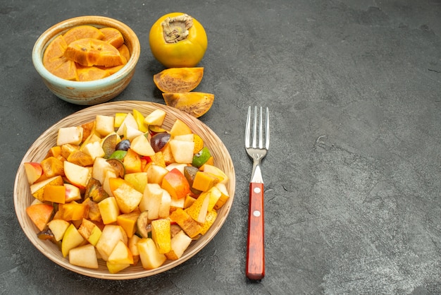 Free photo top view of fruity salad with fresh sliced fruits