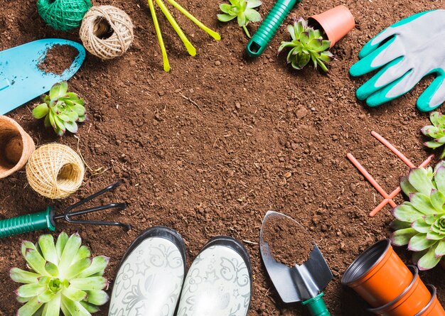 Top view of gardening tools on the ground