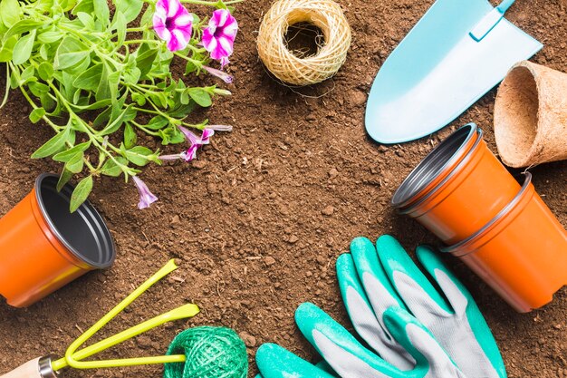 Top view of gardening tools on the ground