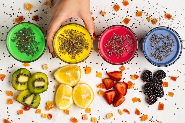 Top view glasses with colorful smoothies