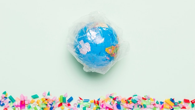 Free photo top view globe covered in plastic