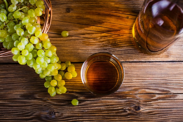 Top view grape juice and fruit on table