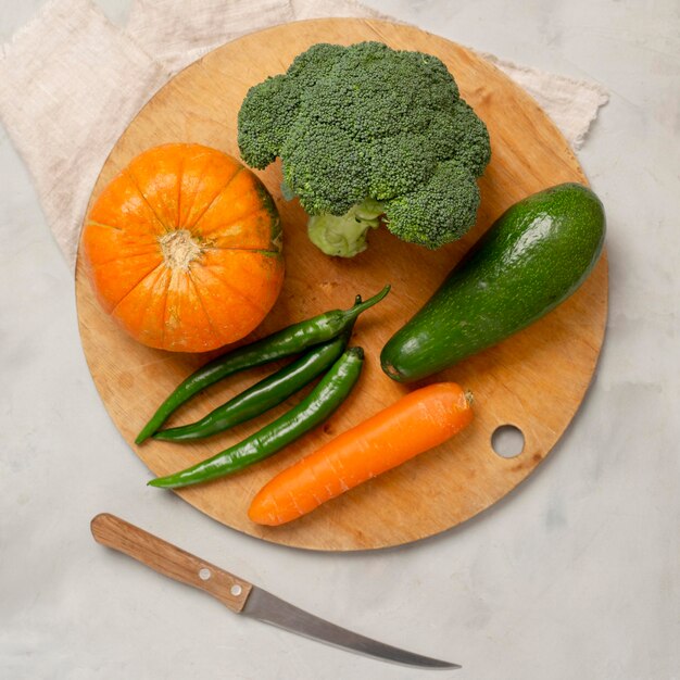 Top view green and orange vegetables