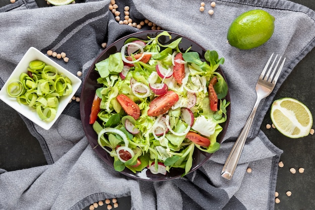 Free photo top view greenery salad on table