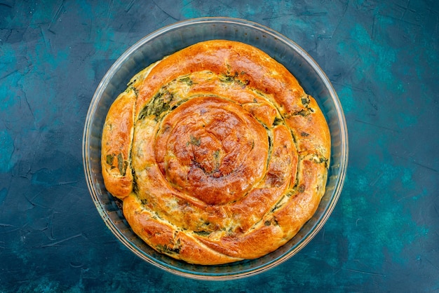 Free Photo top view greeny pastry with greens inside on dark background.