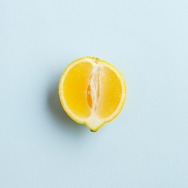 Free photo top view half of genetically enhanced lemon