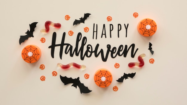 Free Photo top view halloween concept with greeting