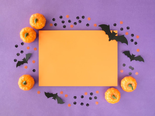 Free Photo top view halloween concept with pumpkins