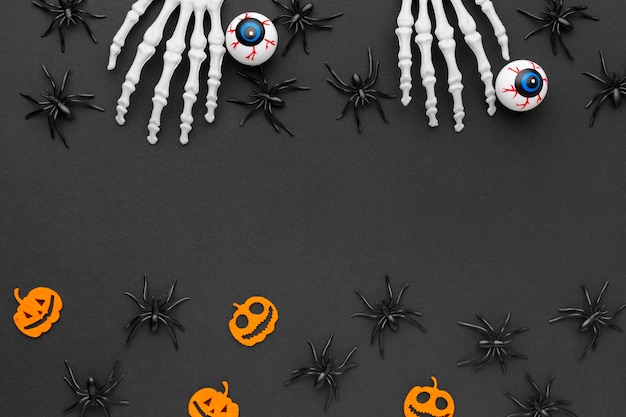 Free photo top view halloween concept with spiders