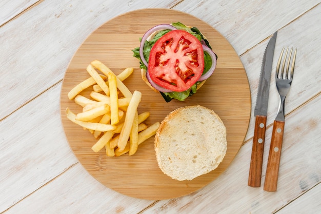 Top view hamburger on wooden board