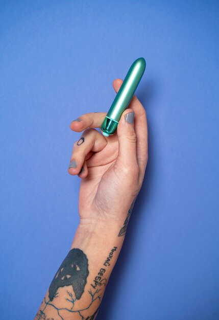 Top view hand holding vibrator