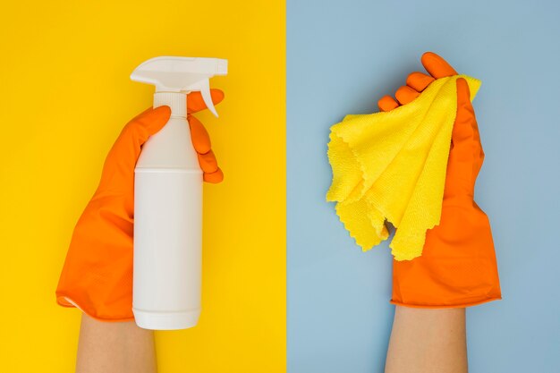 Top view hands holding cleaning equipment