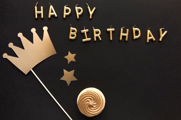 Top view happy birthday message with crown ornament