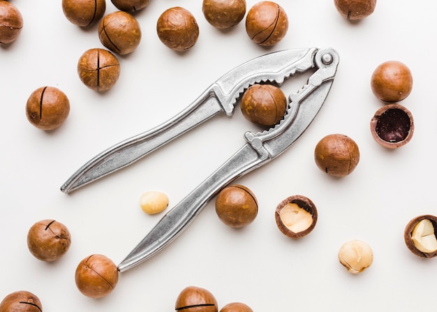 Top view hazelnuts with nut cracker