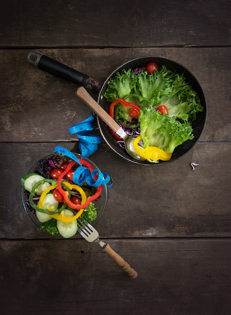 Free Photo top view of healthy lunch with a measuring tape