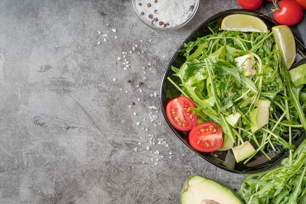 Free photo top view healthy salad ready to be served