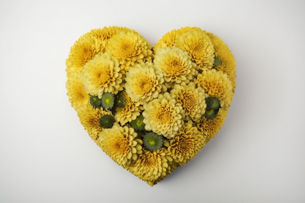 Top view of heart made of blooming flowers