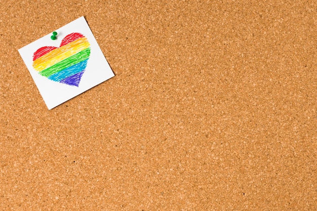 Free photo top view heart in rainbow colors with copy space