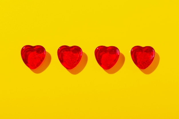 Free Photo top view over  heart shaped lollipops