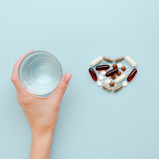 Top view heart shaped pills arrangement