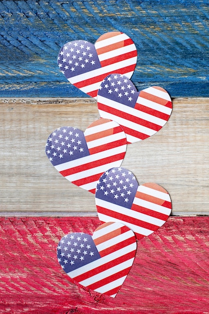 Free Photo top view heart shaped usa flags